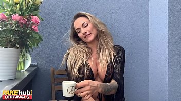 Sexy Blonde Michaela Isizzu Pleasures Herself on the Balcony