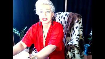 Hot MILF Aimee in fishnet and red heels moans in pleasure