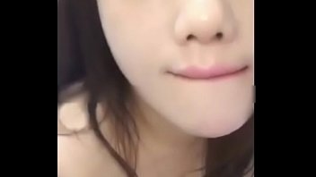 Young Asian beauty gives passionate oral pleasure